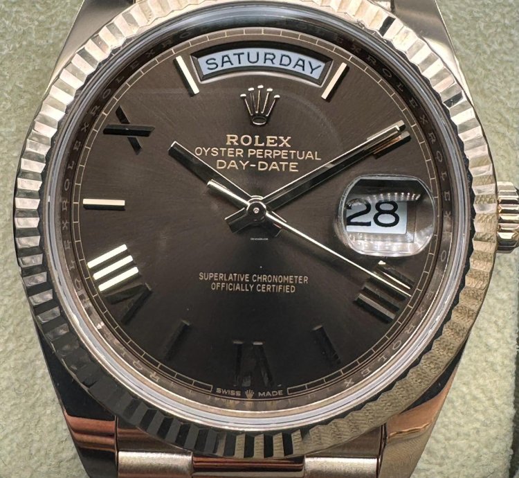 Rolex Day-date 40 Chocolate Roman Dial Unworn