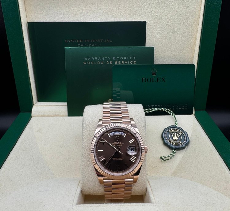 Rolex Day-date 40 Chocolate Roman Dial Unworn