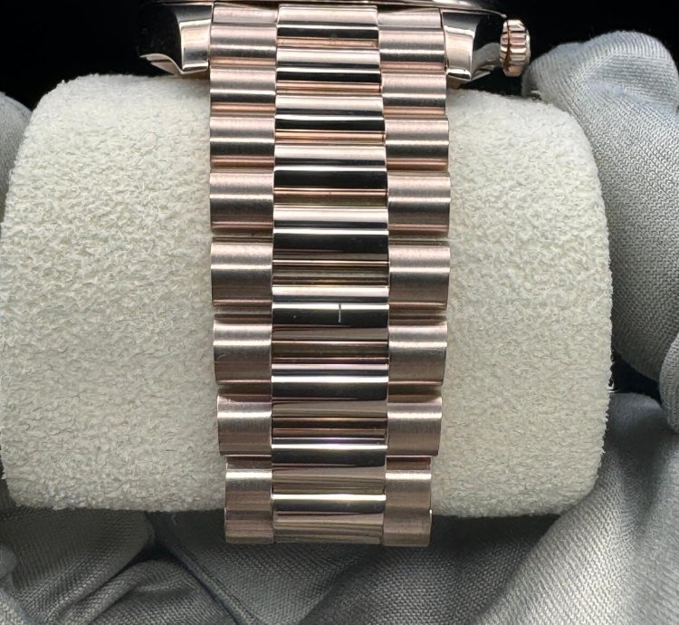 Rolex Day-date 40 Chocolate Roman Dial Unworn