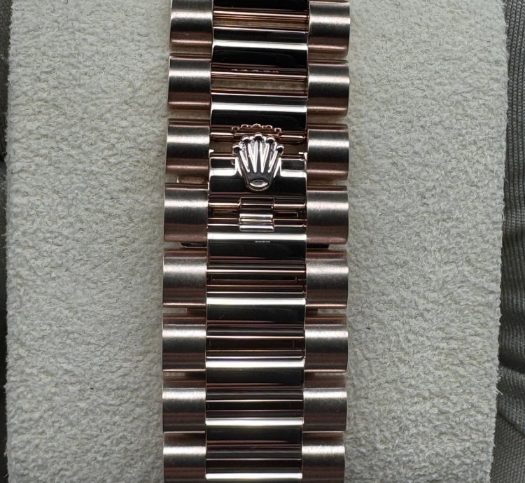 Rolex Day-date 40 Chocolate Roman Dial Unworn