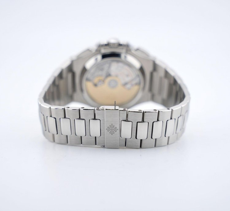 Patek Philippe Nautilus Chronograph Black Dial With White Gold Indexes - With Extract From The Archives