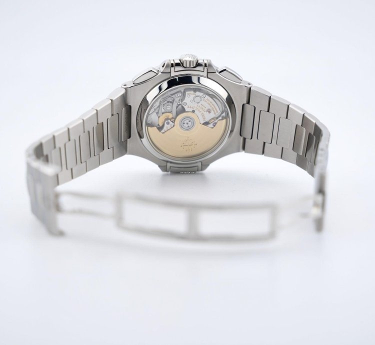 Patek Philippe Nautilus Chronograph Black Dial With White Gold Indexes - With Extract From The Archives