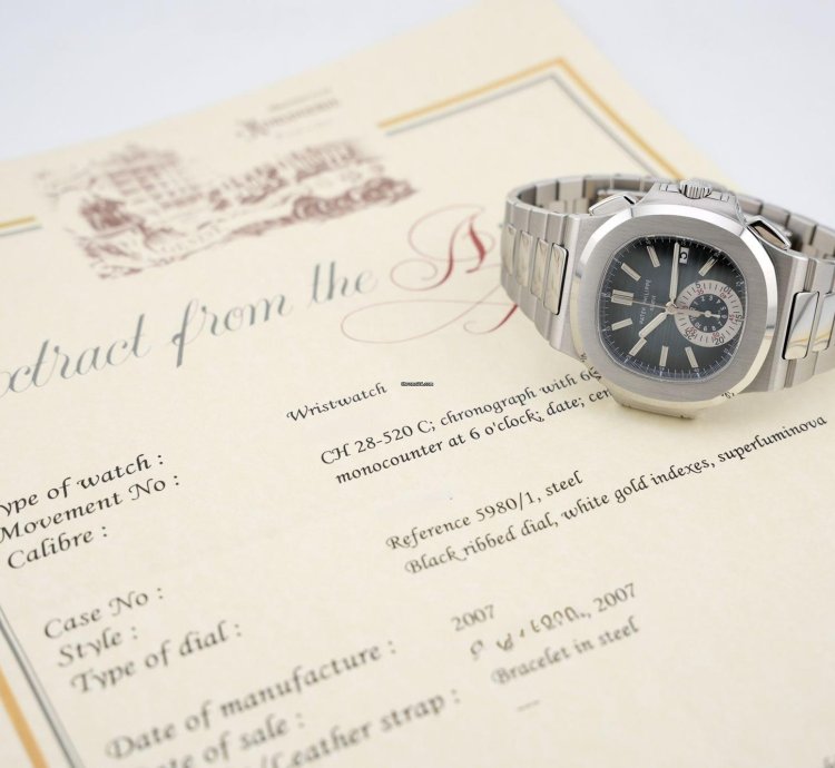 Patek Philippe Nautilus Chronograph Black Dial With White Gold Indexes - With Extract From The Archives