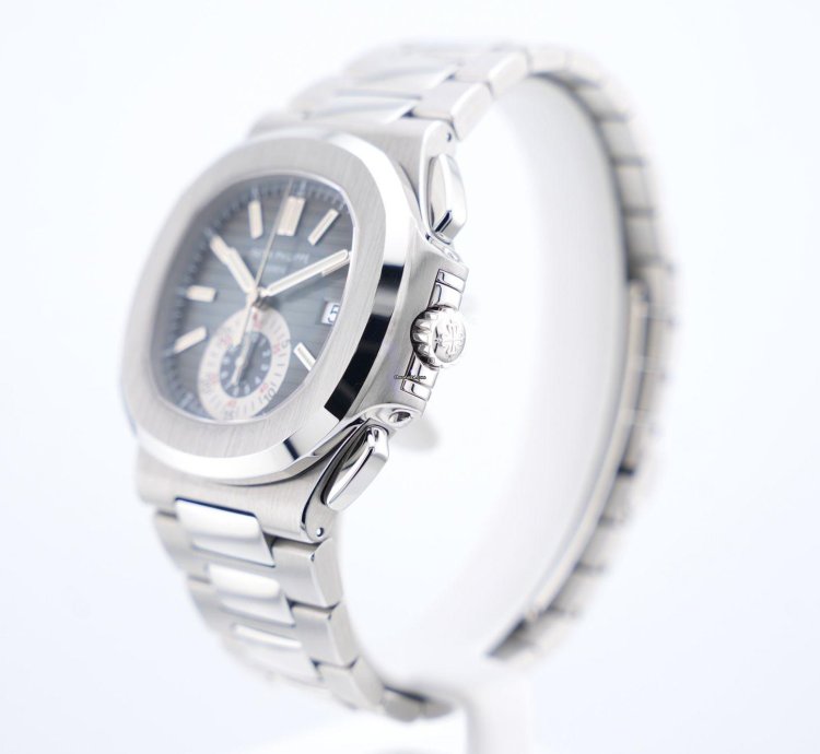 Patek Philippe Nautilus Chronograph Black Dial With White Gold Indexes - With Extract From The Archives
