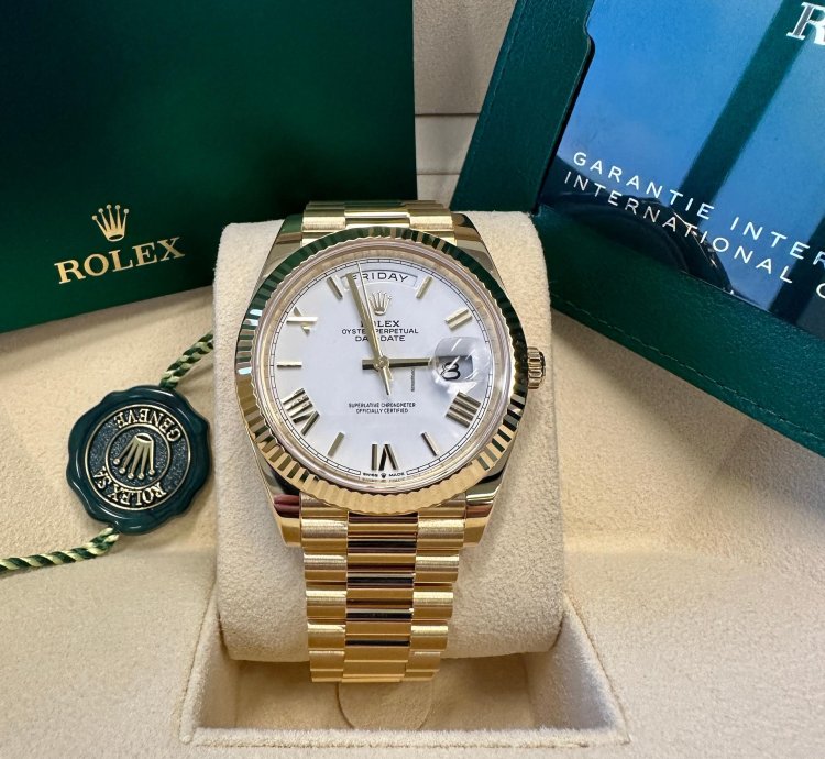Rolex Day-date 40 New 2023 White Roman Dial Yellow Gold Fluted Bezel Jubilee Bracelet