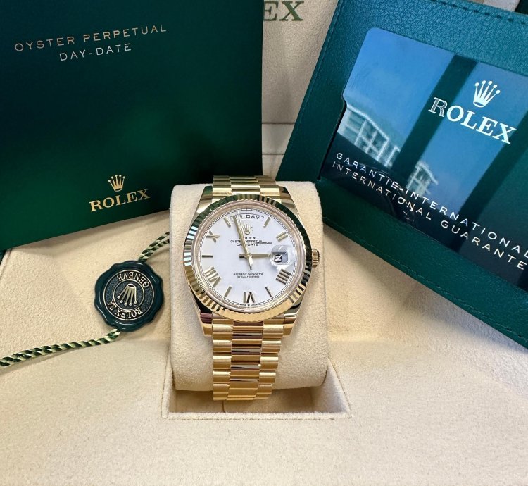 Rolex Day-date 40 New 2023 White Roman Dial Yellow Gold Fluted Bezel Jubilee Bracelet
