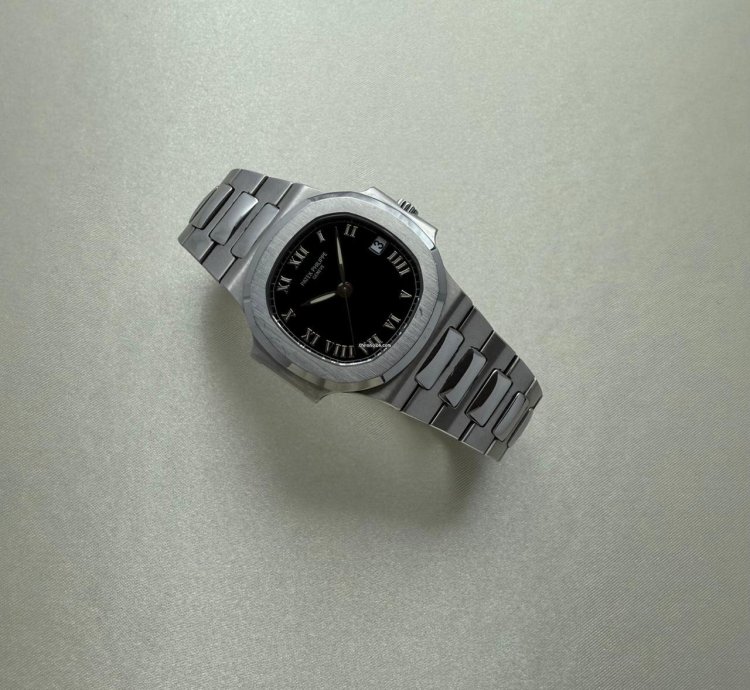 Patek Philippe Nautilus In Steel Roman Numerals Black Dial 3800 1a-001