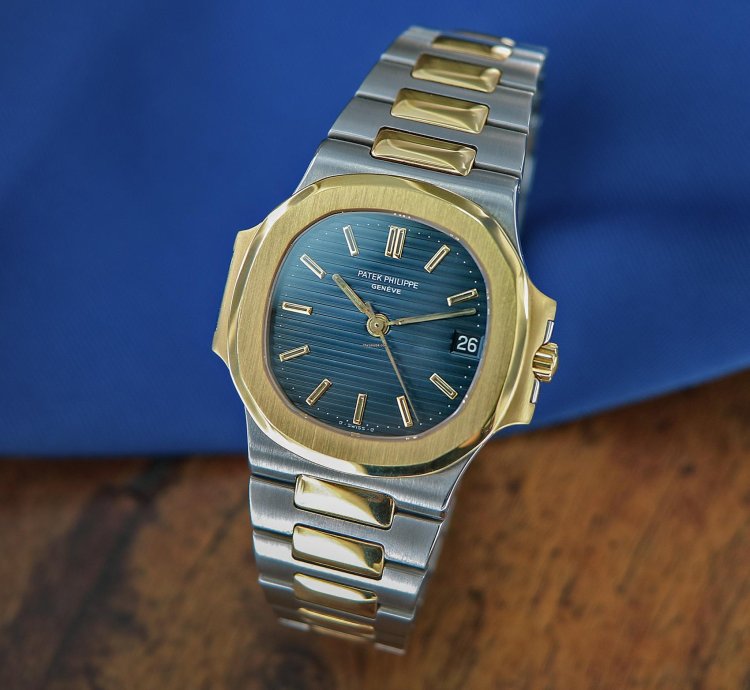 Patek Philippe Nautilus Ref 3800 18kt Yellow Gold And Stainless Steel Blue Patina Dial From Year 1984