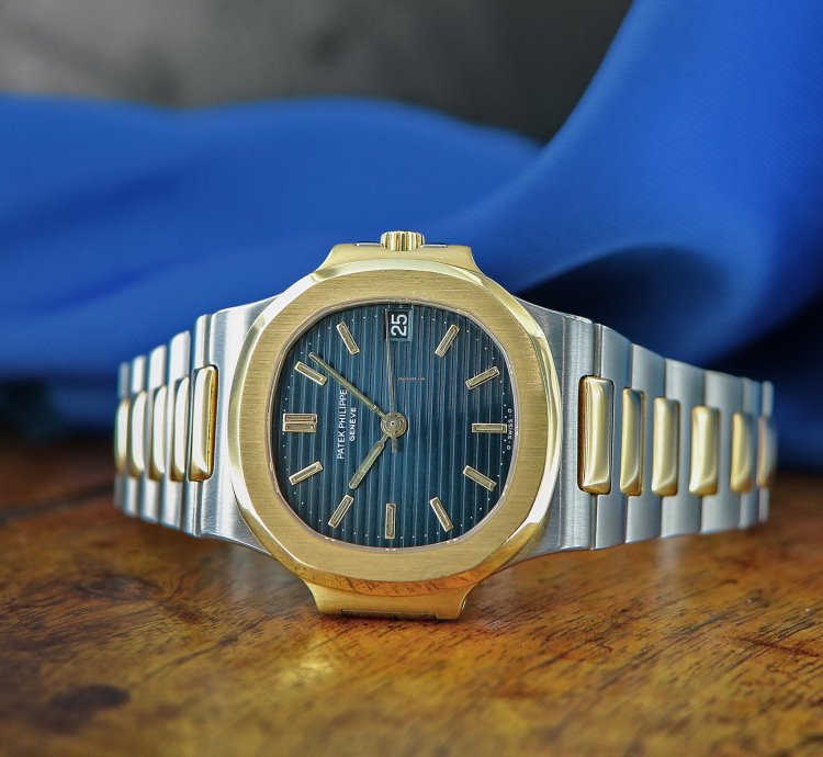 Patek Philippe Nautilus Ref 3800 18kt Yellow Gold And Stainless Steel Blue Patina Dial From Year 1984