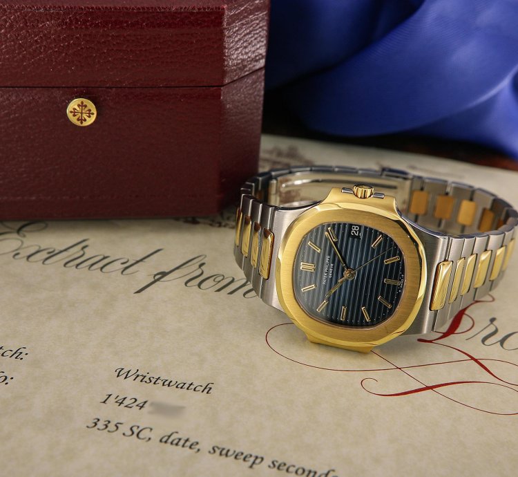 Patek Philippe Nautilus Ref 3800 18kt Yellow Gold And Stainless Steel Blue Patina Dial From Year 1984