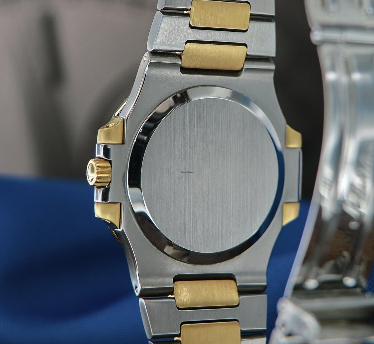 Patek Philippe Nautilus Ref 3800 18kt Yellow Gold And Stainless Steel Blue Patina Dial From Year 1984