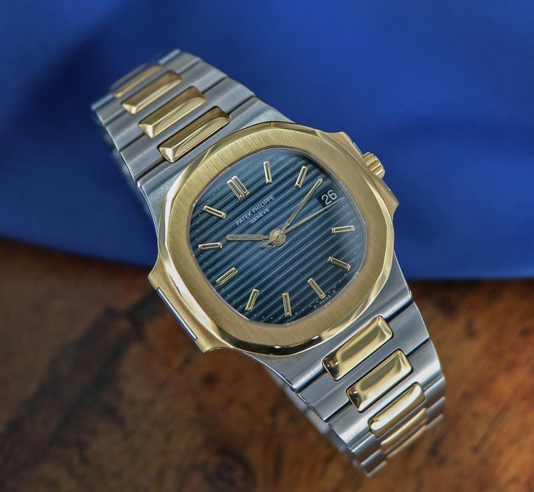 Patek Philippe Nautilus Ref 3800 18kt Yellow Gold And Stainless Steel Blue Patina Dial From Year 1984