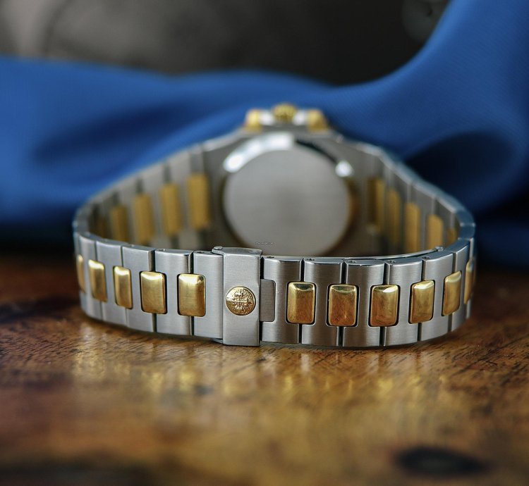 Patek Philippe Nautilus Ref 3800 18kt Yellow Gold And Stainless Steel Blue Patina Dial From Year 1984