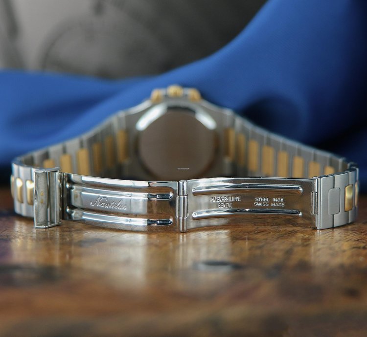 Patek Philippe Nautilus Ref 3800 18kt Yellow Gold And Stainless Steel Blue Patina Dial From Year 1984