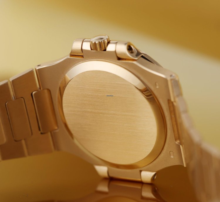Patek Philippe Nautilus Ref 3800 1j White Dial - Baton And Roman Numerals 38mm 18k Yellow Gold