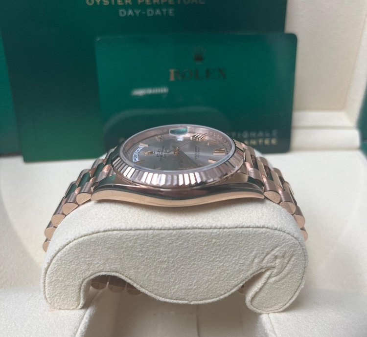 Rolex Day-date 40 Rose Gold Sundust Roman Dial Fluted Bezel 228235