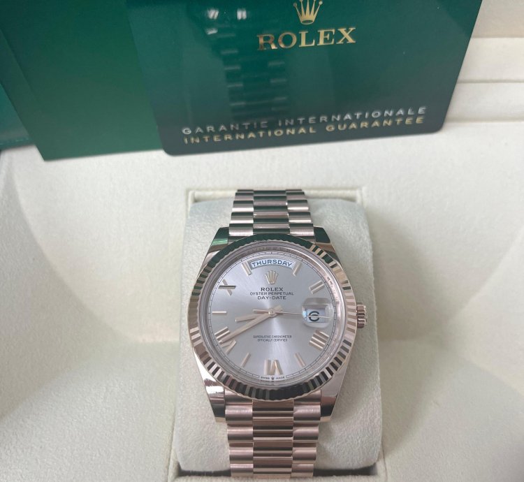 Rolex Day-date 40 Rose Gold Sundust Roman Dial Fluted Bezel 228235