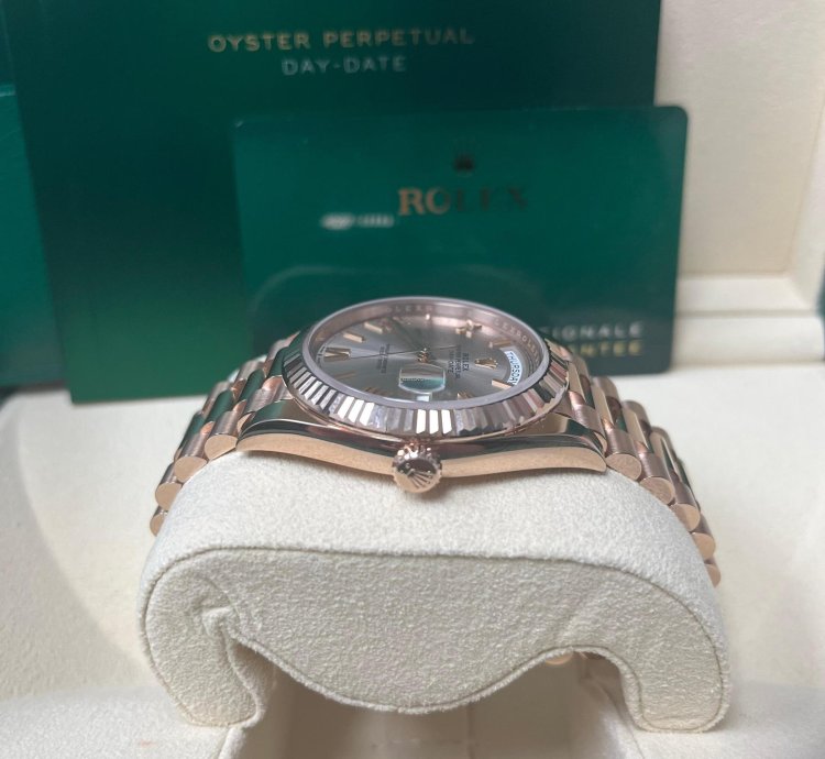 Rolex Day-date 40 Rose Gold Sundust Roman Dial Fluted Bezel 228235