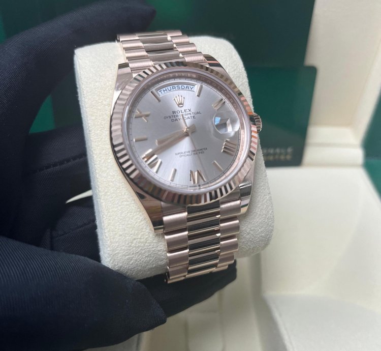 Rolex Day-date 40 Rose Gold Sundust Roman Dial Fluted Bezel 228235