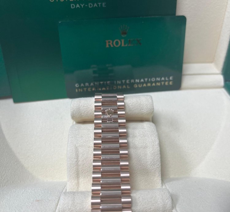 Rolex Day-date 40 Rose Gold Sundust Roman Dial Fluted Bezel 228235