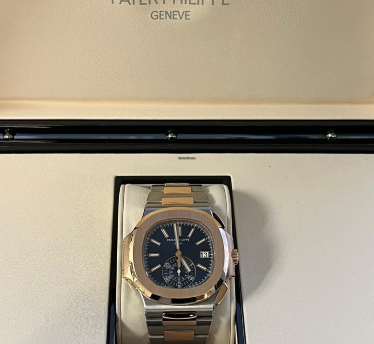 Patek Philippe Nautilus Rose Gold Stainless Steel Blue Dial Mens Watch 5980 1ar