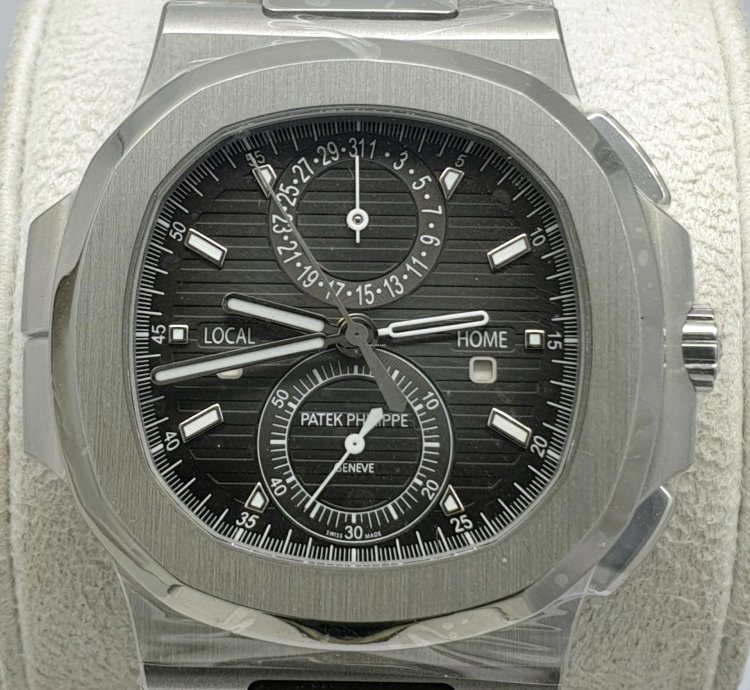 Patek Philippe Nautilus Travel Time Like New