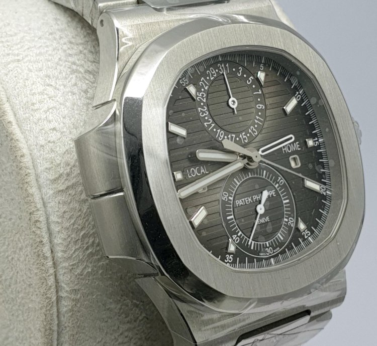 Patek Philippe Nautilus Travel Time Like New
