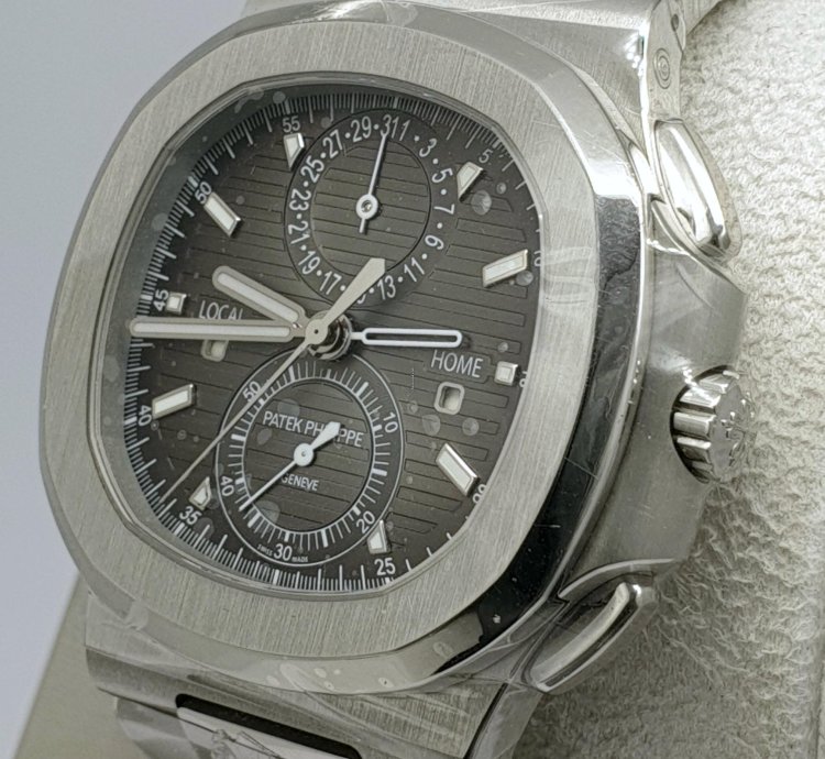 Patek Philippe Nautilus Travel Time Like New