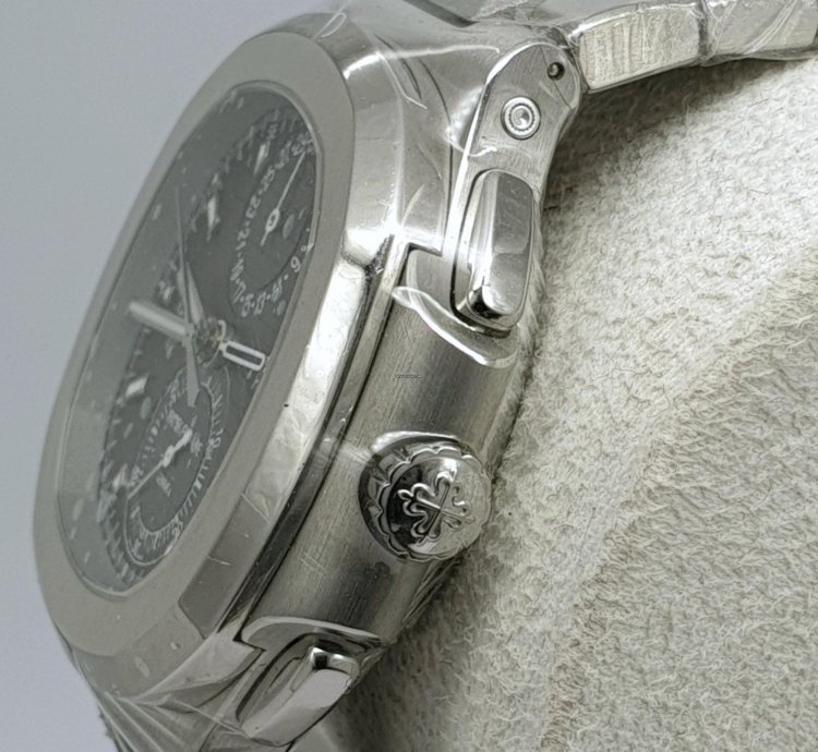 Patek Philippe Nautilus Travel Time Like New