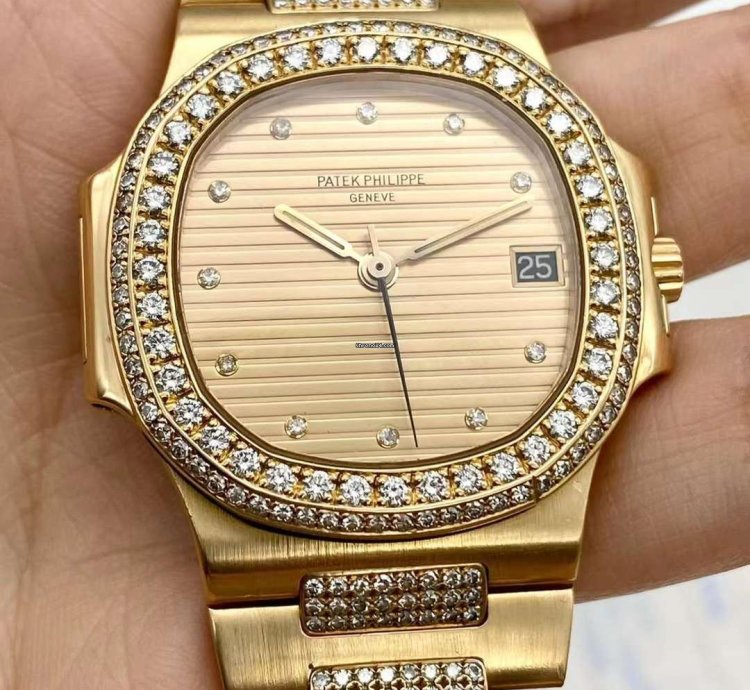 Patek Philippe Nautilus Yellow Gold Diamond Automatic Watch 37mm Nautilus