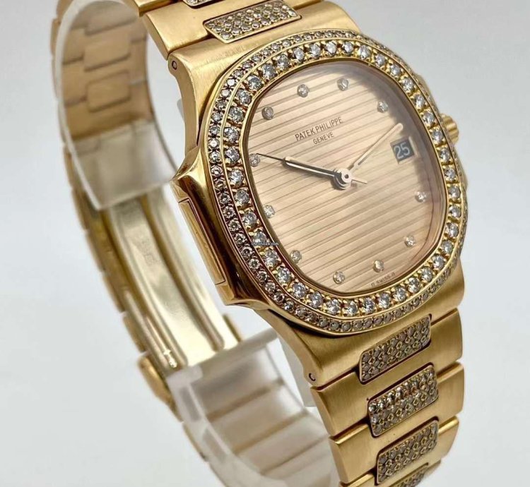 Patek Philippe Nautilus Yellow Gold Diamond Automatic Watch 37mm Nautilus