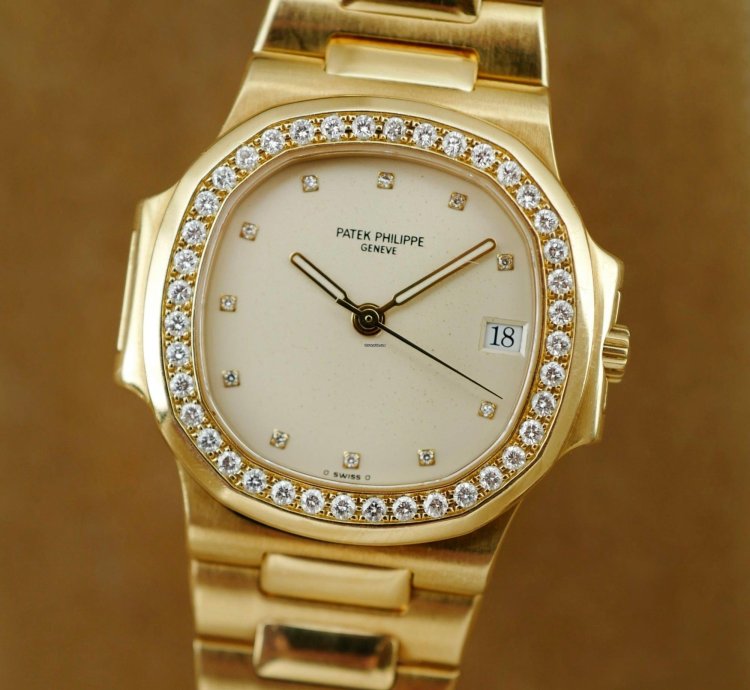 Patek Philippe Nautilus Yellow Gold Nautilus Ref 3800 With Diamond Bezel And Ceramic Dial
