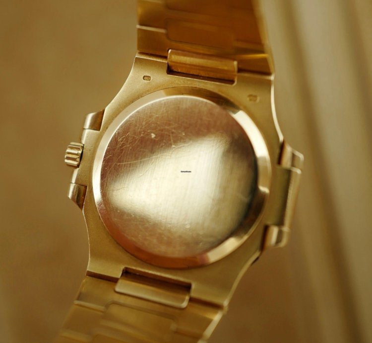 Patek Philippe Nautilus Yellow Gold Nautilus Ref 3800 With Diamond Bezel And Ceramic Dial