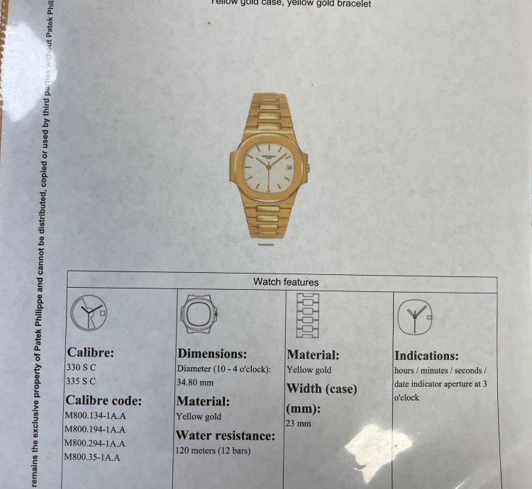 Patek Philippe Nautilus Yellow Gold White Dial 37 5mm