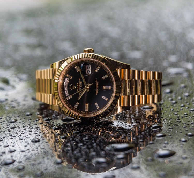 Rolex Day-date 40 Yellow Gold - Black Dial - Diamond Baguette