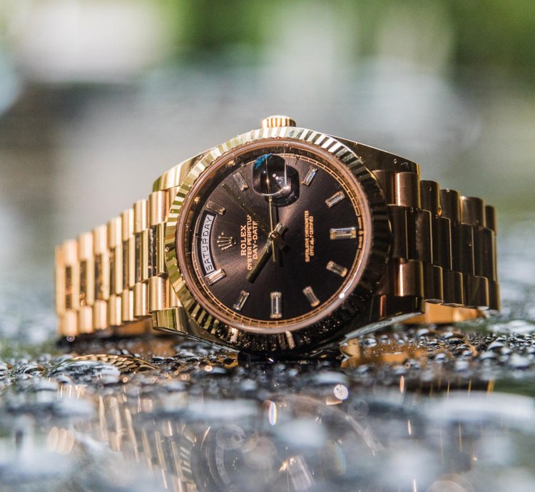 Rolex Day-date 40 Yellow Gold - Black Dial - Diamond Baguette