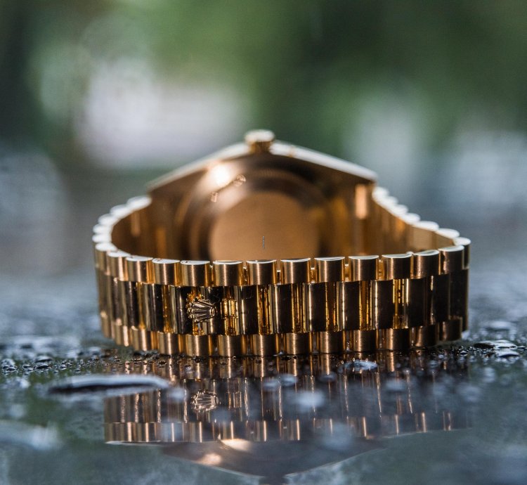 Rolex Day-date 40 Yellow Gold - Black Dial - Diamond Baguette