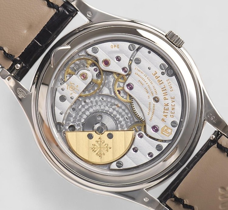 Patek Philippe Perpetual Calendar 5140g Ultra Thin 18k White Gold Silver Dial Description