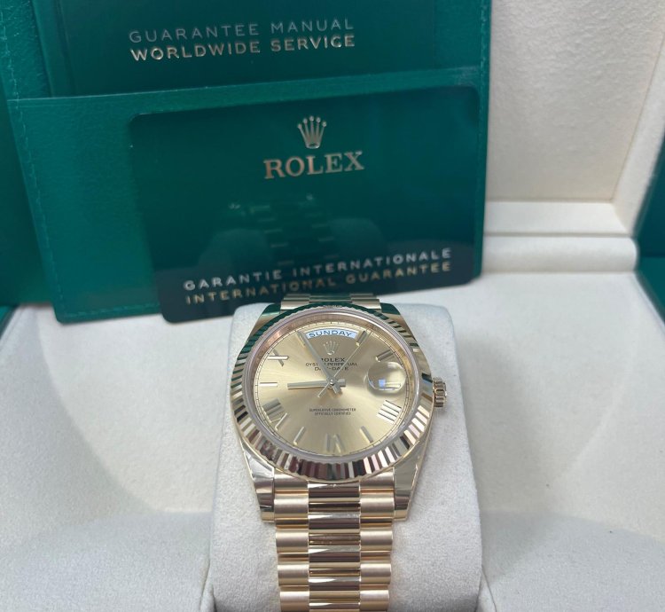 Rolex Day-date 40 Yellow Gold Champagne Roman Dial Fluted Bezel 228238