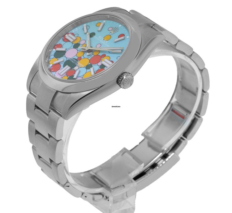 Rolex Oyster Perpetual 41 41mm Stainless Steel Celebration Index Dial Smooth Bezel 124300