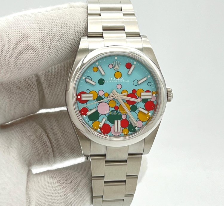 Rolex Oyster Perpetual 41 Turquoise Blue Celebration Motif Index Dial