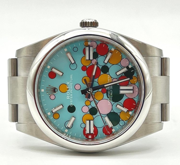 Rolex Oyster Perpetual 41 Turquoise Blue Celebration Motif Index Dial