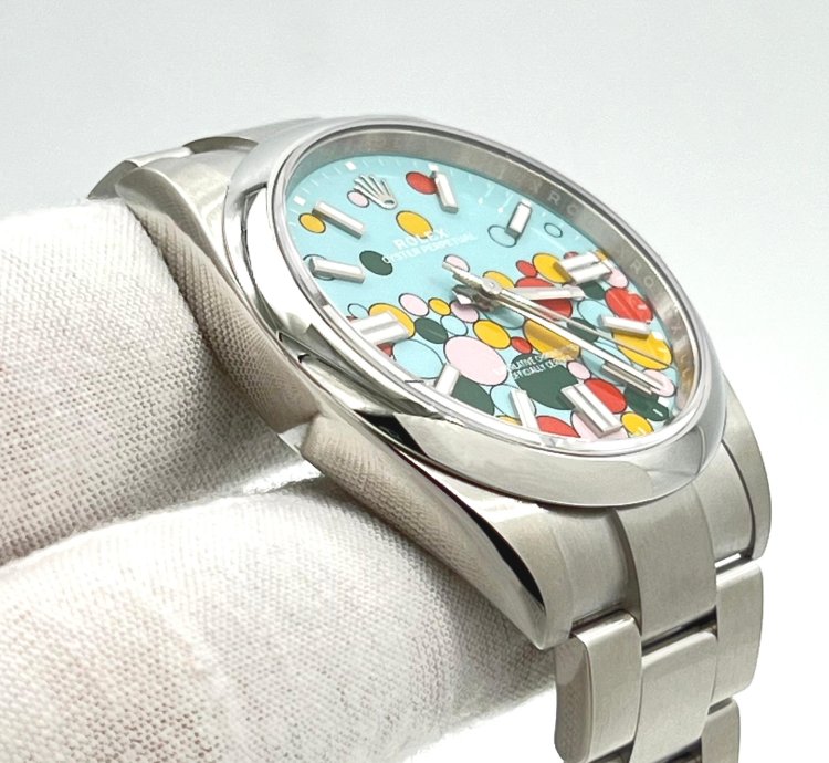Rolex Oyster Perpetual 41 Turquoise Blue Celebration Motif Index Dial