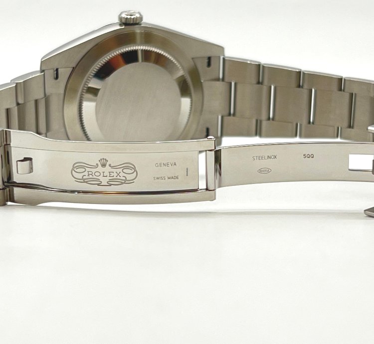 Rolex Oyster Perpetual 41 Turquoise Blue Celebration Motif Index Dial