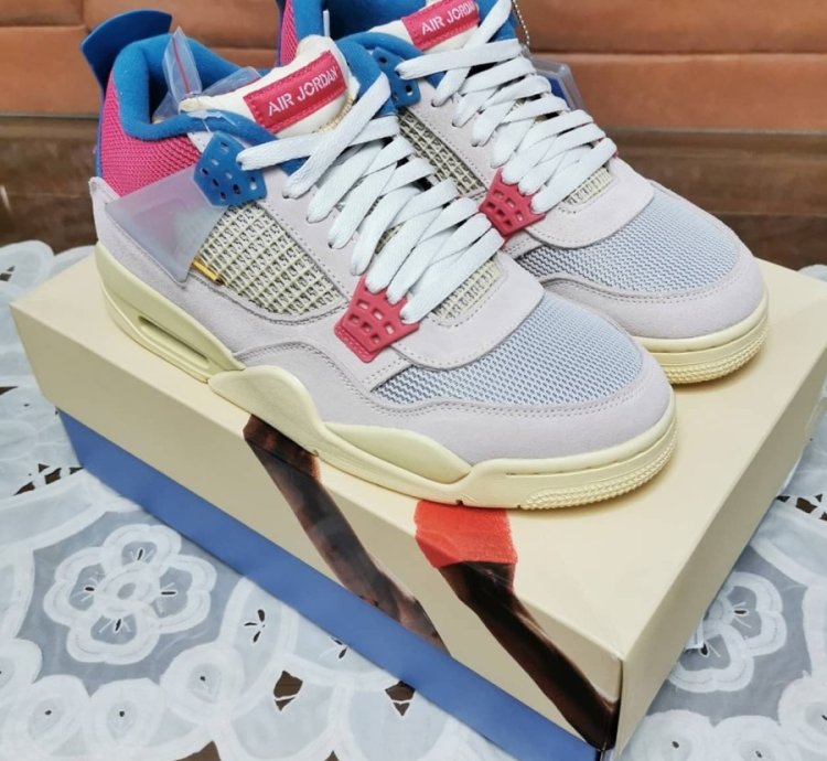 Jordan 4 Retro Union Guava Ice