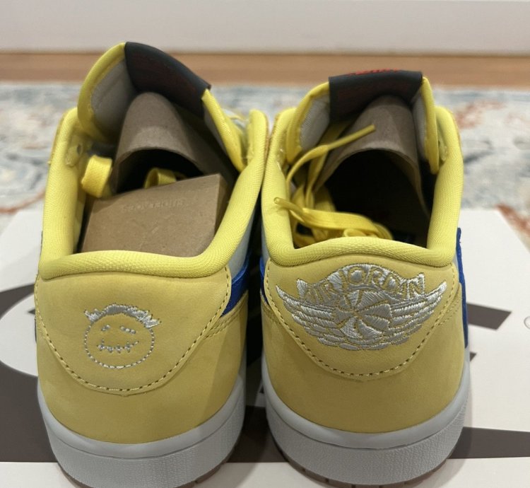 Travis Scott Jordan 1 Low Canary
