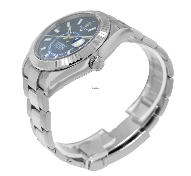 Rolex Sky-dweller 42mm White Gold Steel Blue Index Dial Fluted Bezel 336934