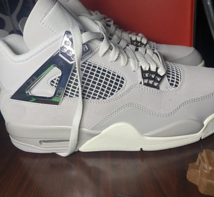 Jordan 4 Frozen Moments