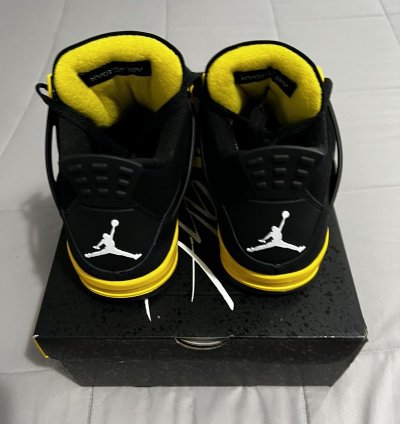 Jordan 4 Black and Yellow
