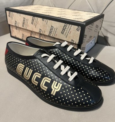 Gucci black gold star sneaker